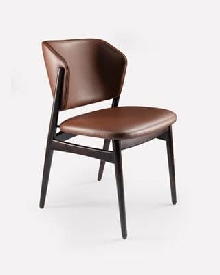 rasahaus MILO premium brown upholstered dining chair with sculpted wooden back and tapered legs