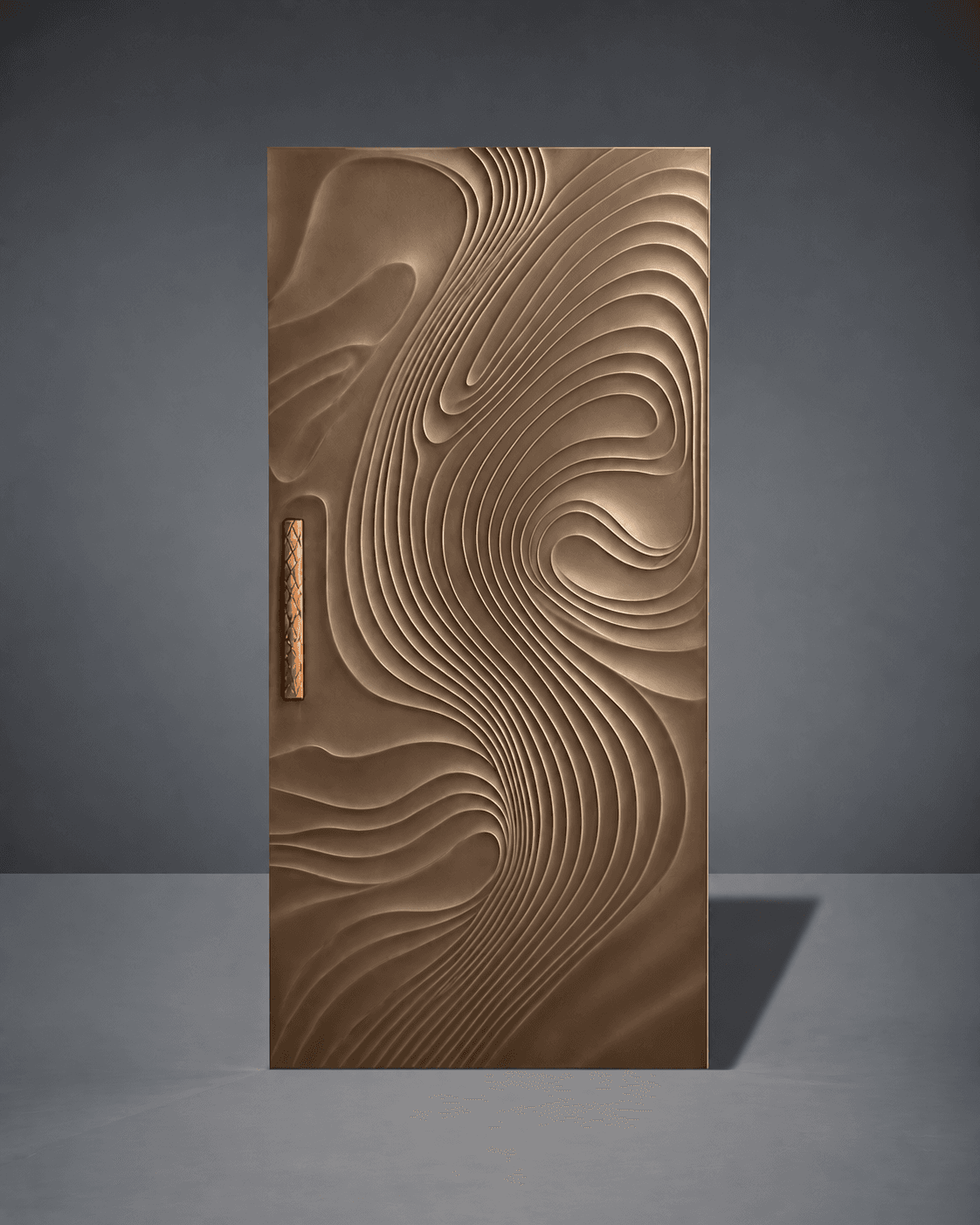 Contour Wave Relief Main Door displayed in a modern setting, featuring flowing sculpted wave relief lines, a warm neutral wood finish and an elongated textured handle.
