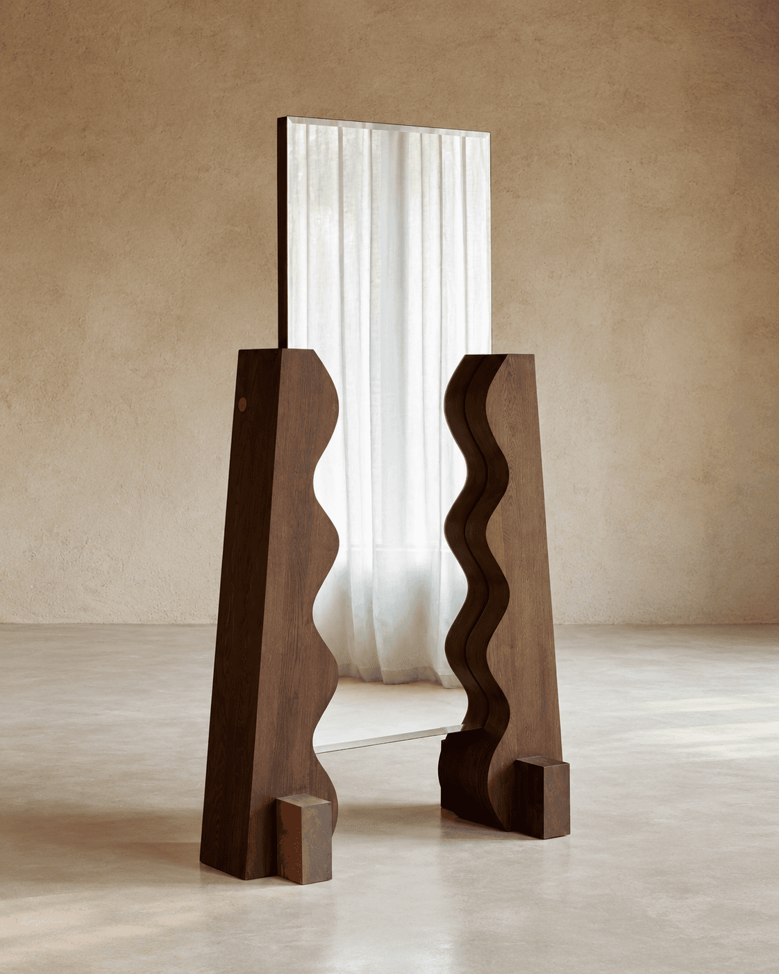 RIVIÈRE sculptural wooden floor standing mirror displayed in a contemporary interior